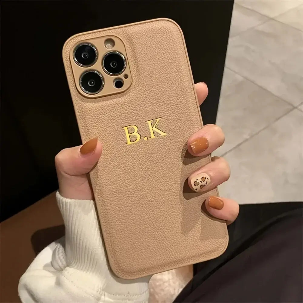 tan phone case with etching.