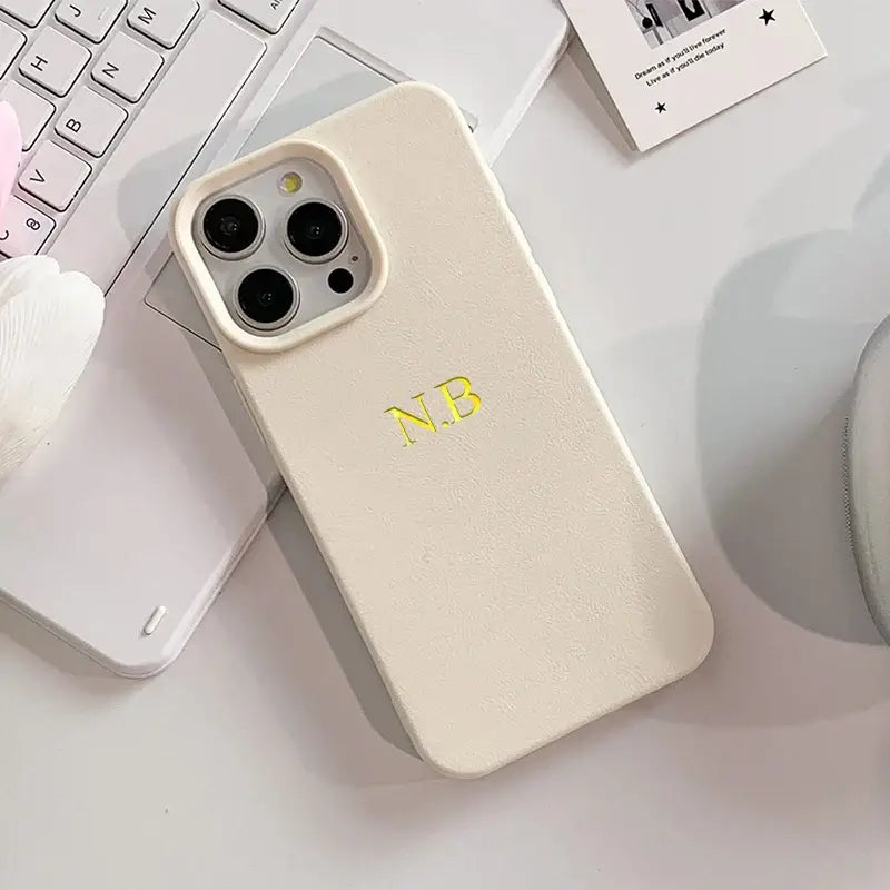 tan case with etching.
